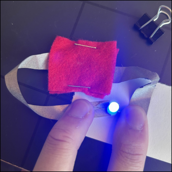 Fabric battery holder test, with less of an OSHA violation.