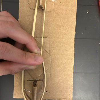 How a user would have to grip/interact with a peg-set up
