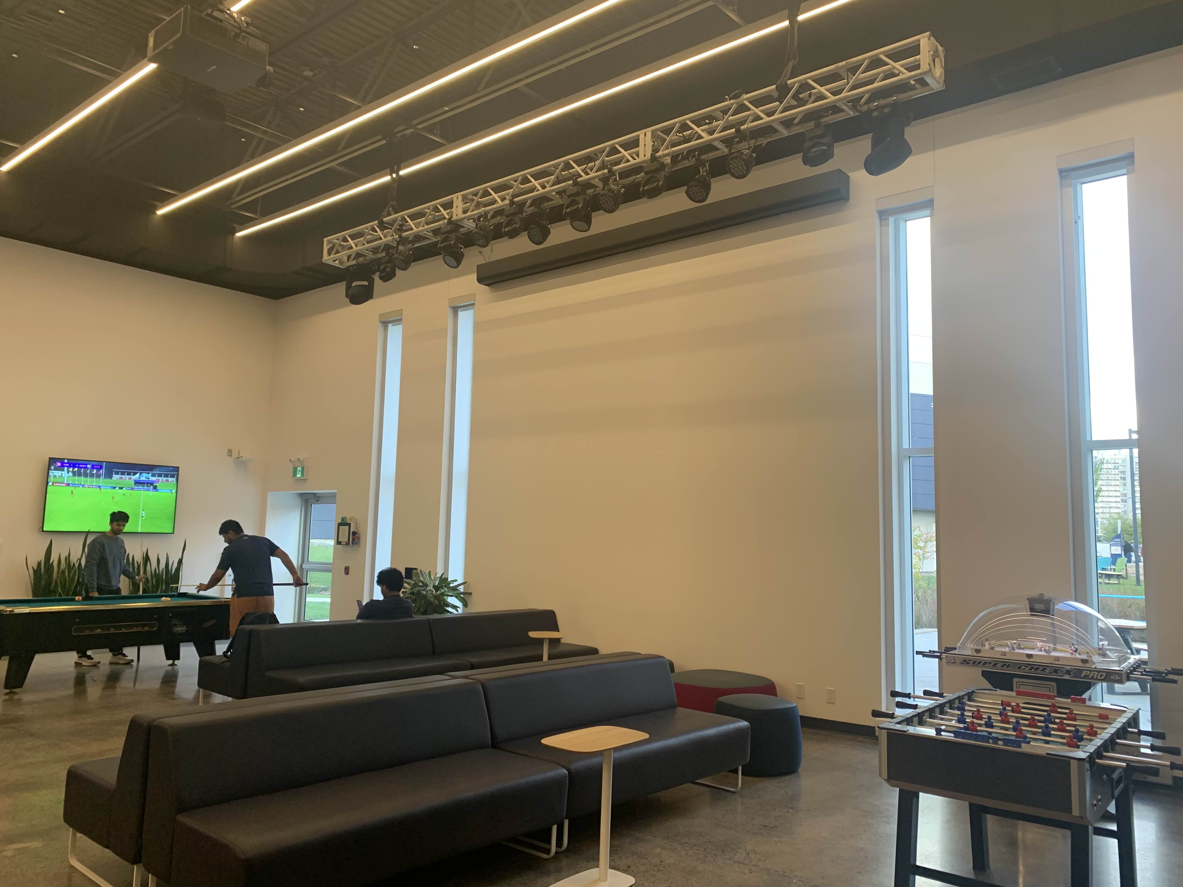 One section of the marquee/student union interior. My group felt the table football (foosball) and pool table's proximity to the couches were too close, and the big stage lights were just... ill fitting for the space.